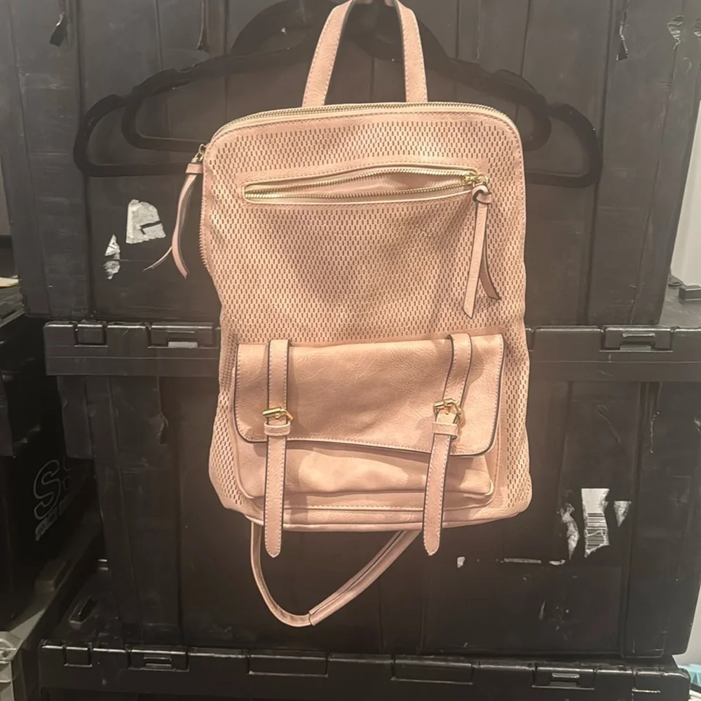 Blush perforated backpack